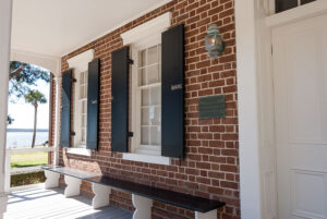 front porch with brick walls